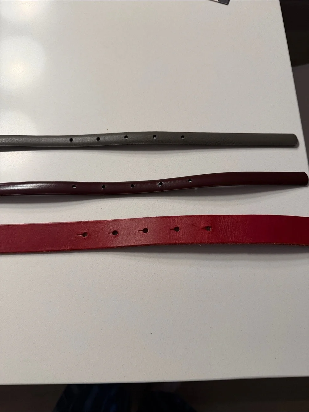 Three pair bundle. Anthropologie Red Leather Waist Belt, H&Mgrey and plum belt.